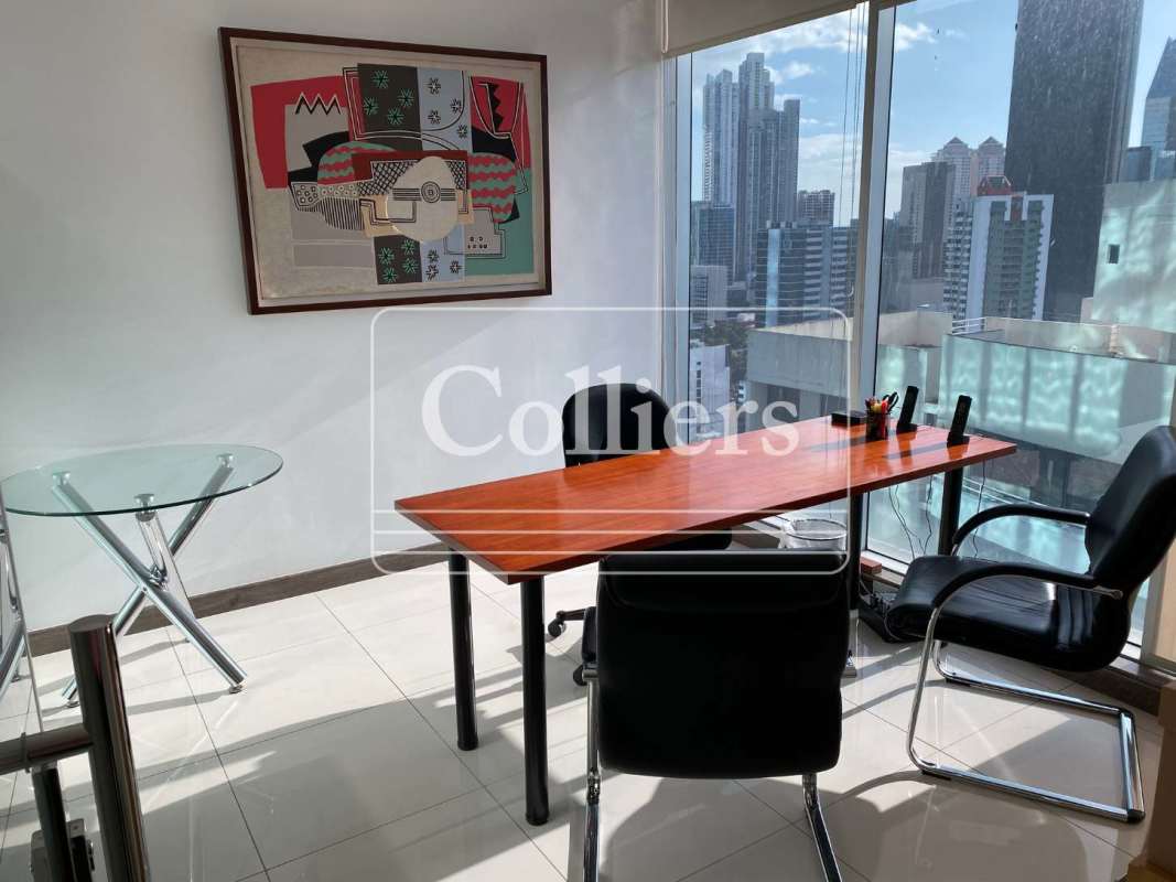 Meeting room with round table, large window city skyline Obarrio Panama Atrium Tower