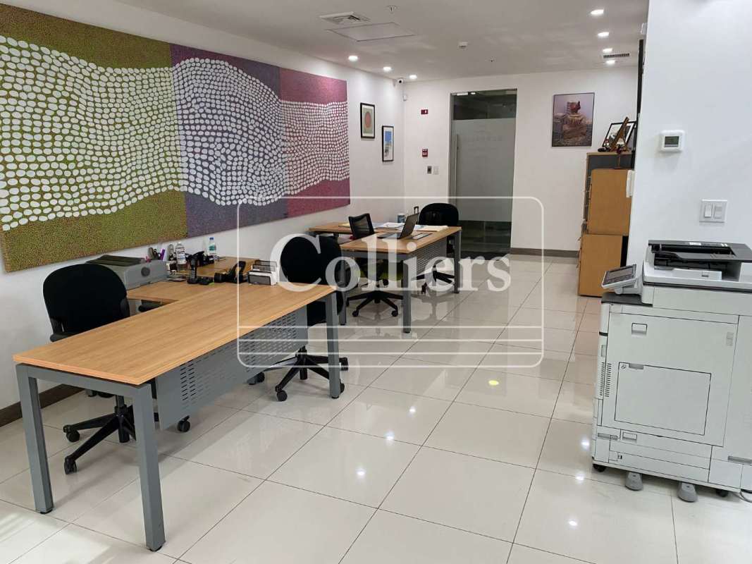 Private office area with large windows and skyline view in PH Atrium Obarrio Panama