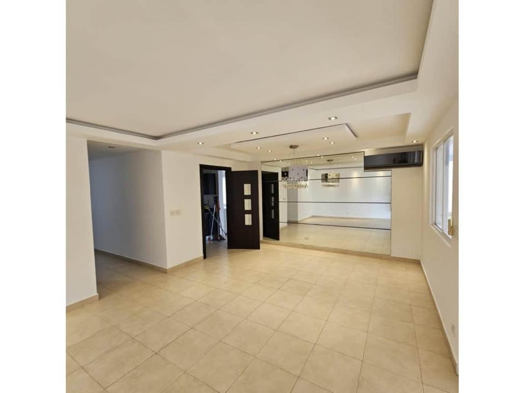 Granite countertop kitchen with stove and cabinets in Villa Navona Brisas del Golf Panama