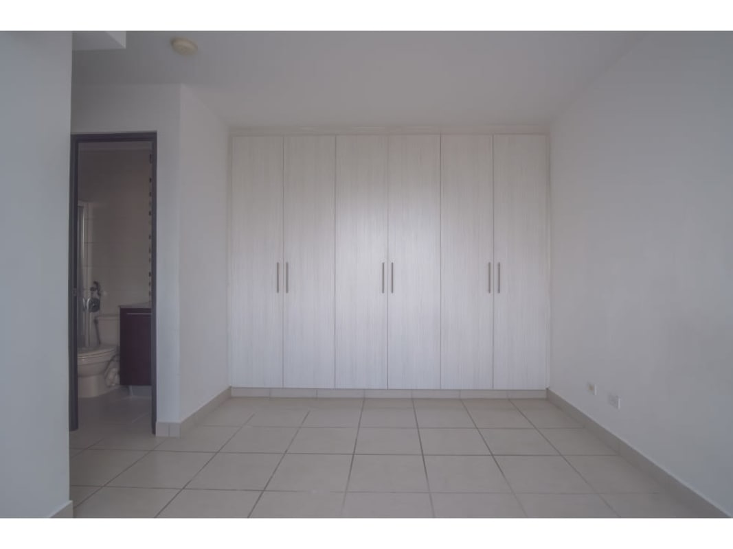 Minimalist bedroom with ensuite bath in apartment PH Lefevre 75 Rio Abajo Panama