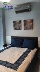 Second bedroom with neutral décor, large window newly built PH Boquete Gardens David