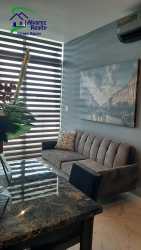 Modern bathroom with glass shower marble tiles PH Residencial Boquete Gardens David Panama