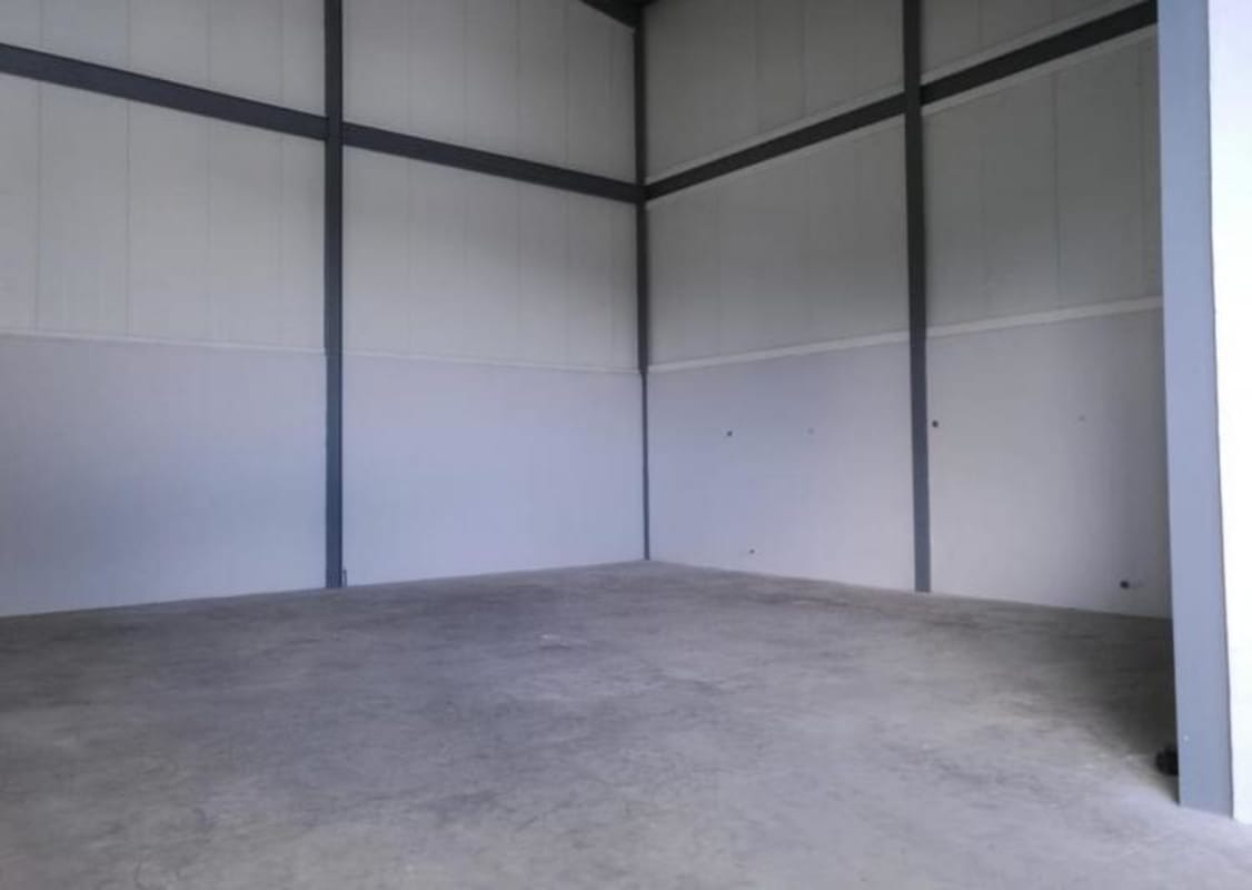 Empty industrial warehouse space with concrete floor and 9.75m high ceilings at Milla 8 Business Park