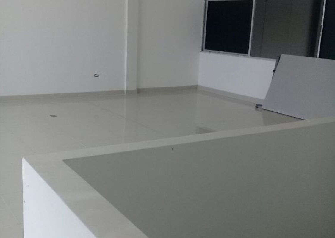 Minimalist empty commercial office space with tile floors at Milla 8 Business Park Panama
