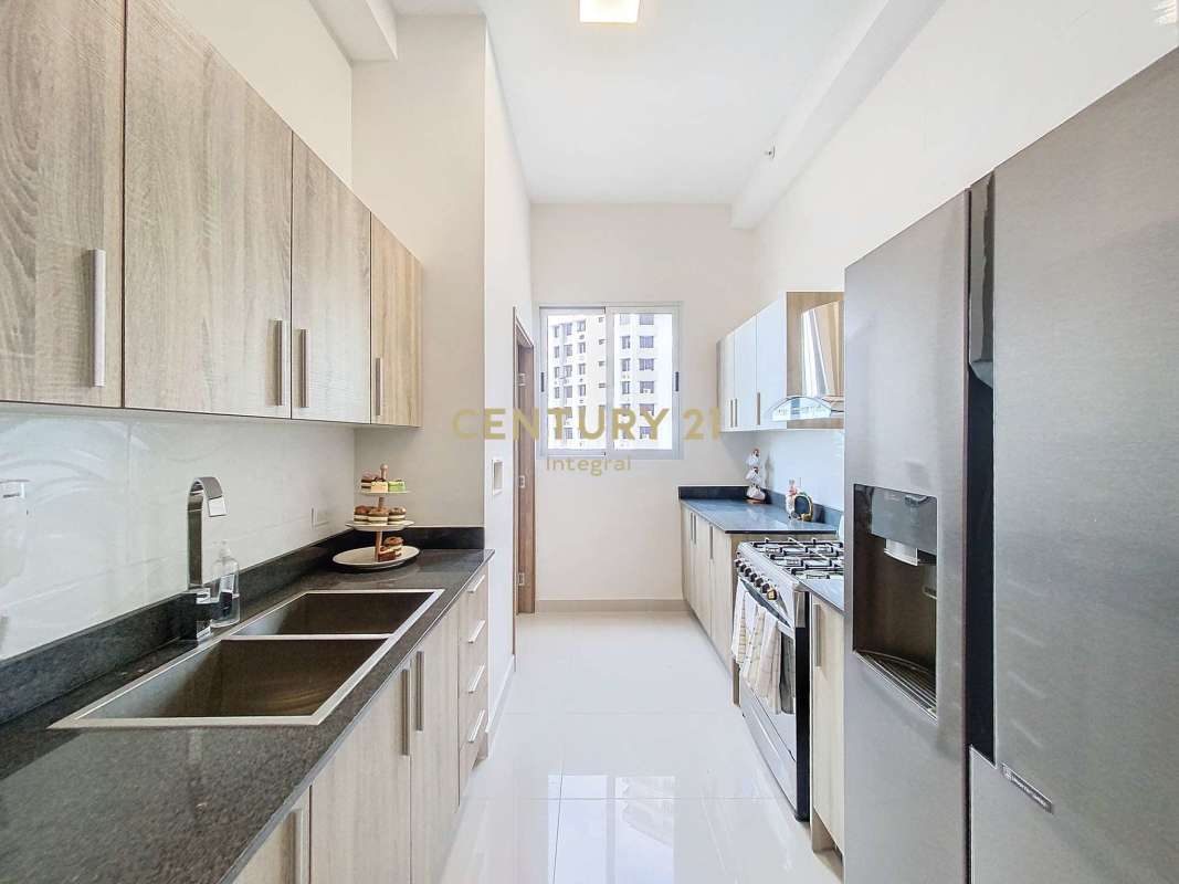 Aerial cityscape of Panama City with mountain background from PH Bella Veduta