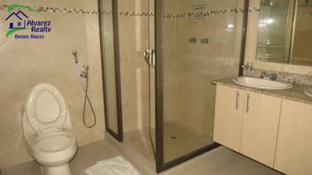 Modern bathroom with shower enclosure, dual sinks, granite countertop in Volcán Chiriquí Panama
