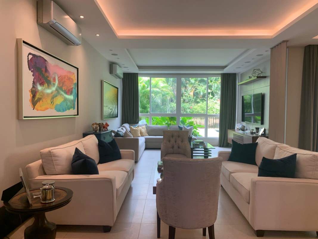 Modern kitchen with stainless appliances, wood cabinetry, stylish finishes in luxury home Santa María Panama