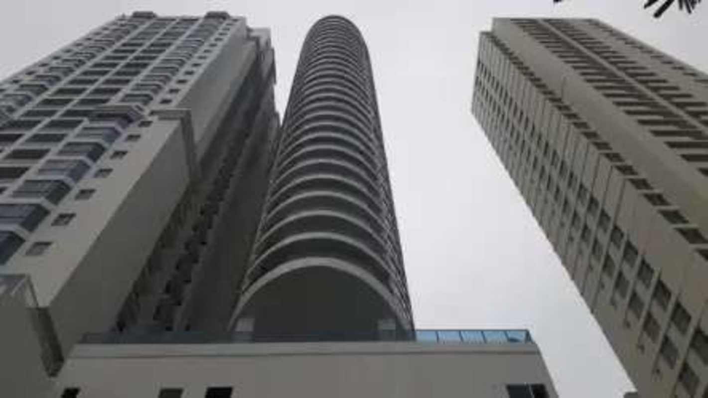 Curved balconies and glass facade view PH Joy Tower Coco del Mar Panama