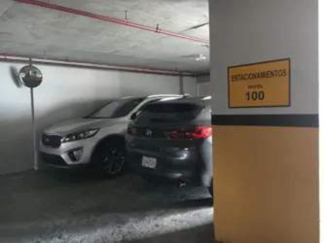 Garage level with marked parking bays inside PH Joy Tower Coco del Mar Panama