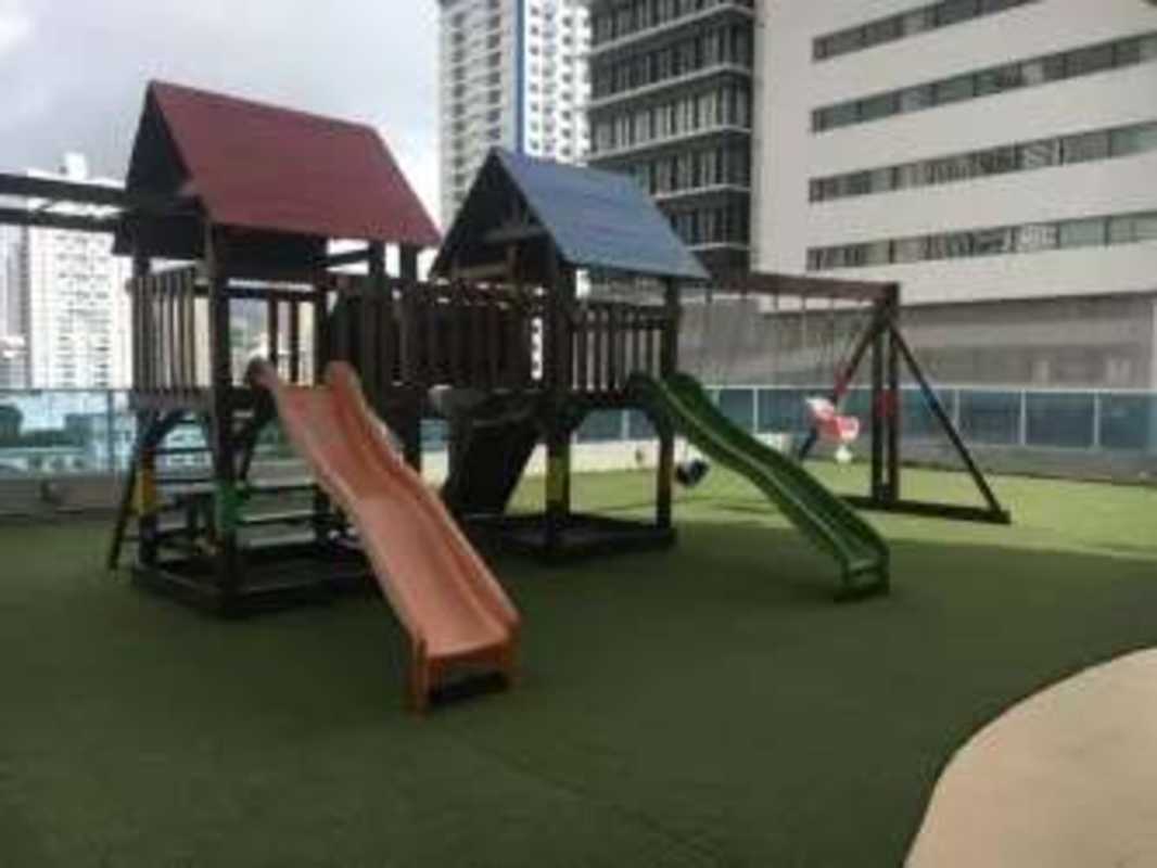 Children’s playground rooftop terrace with slides swings city view PH Joy Tower Panama