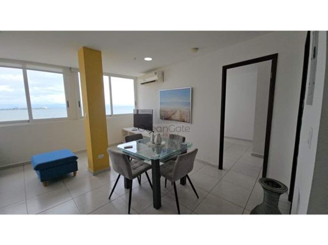 Contemporary lobby with circular reception desk mural design at Bay View on Avenida Balboa Panama