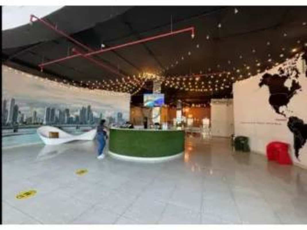 Bright open living dining with large windows ocean skyline view PH Bay View Panama City