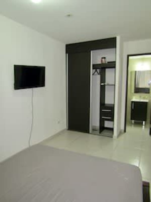 Bedroom with window view of ocean PH Bayview Avenida Balboa Panama City