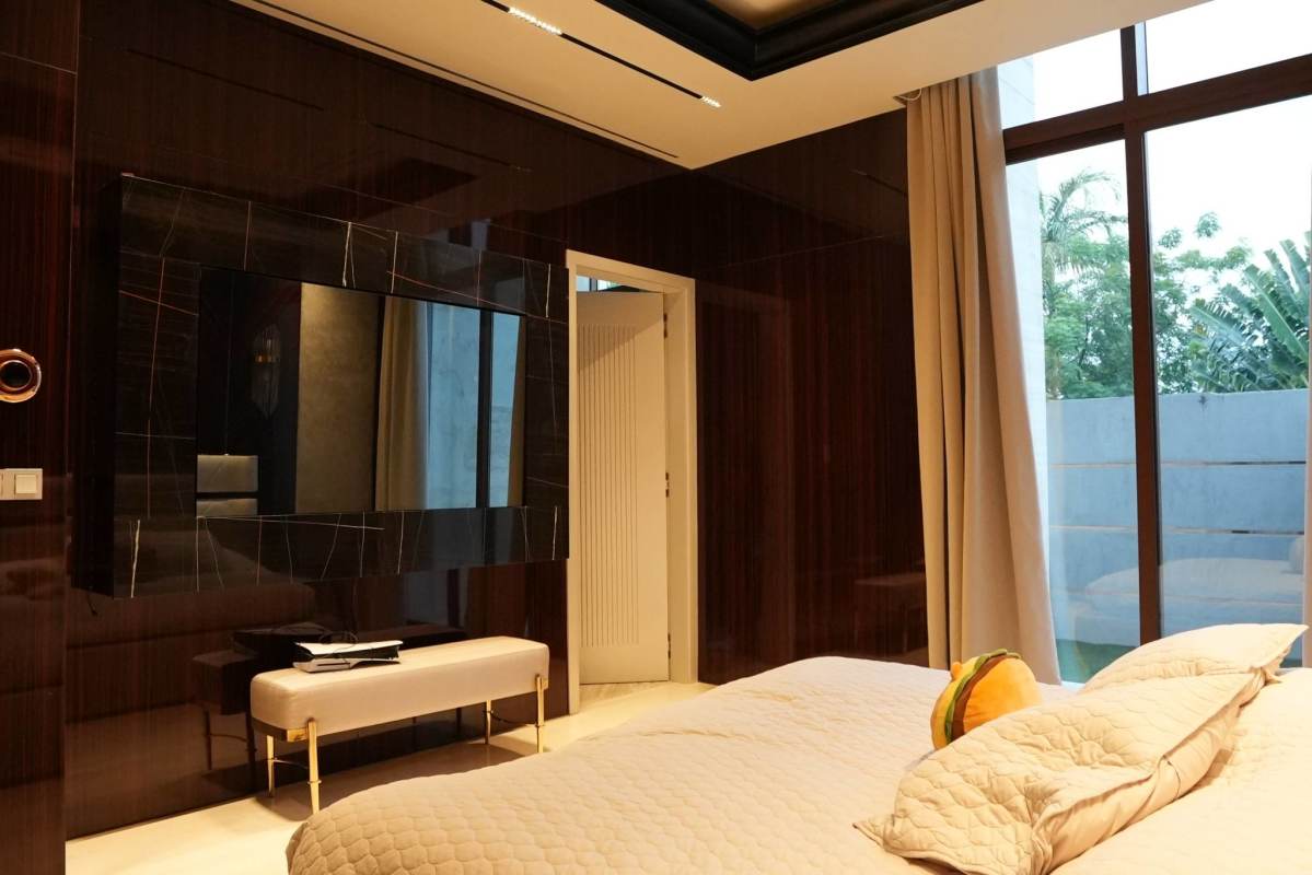 Spacious master bedroom suite facing the ocean in luxury penthouse at Ocean Reef Islands Panama City