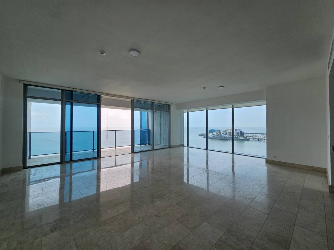 Contemporary living area with marble floors and ocean vistas in PH Grand Tower Punta Pacifica Panama