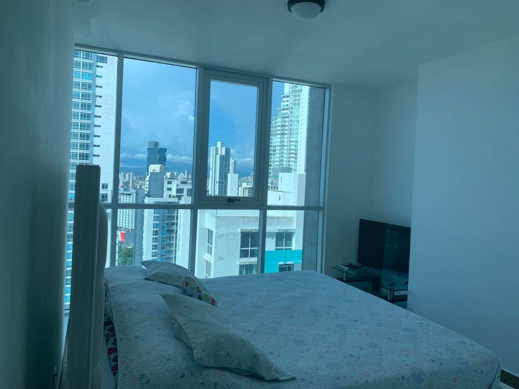 Bedroom with floor to ceiling windows, AC, skyline view PH Dynasty Panama City