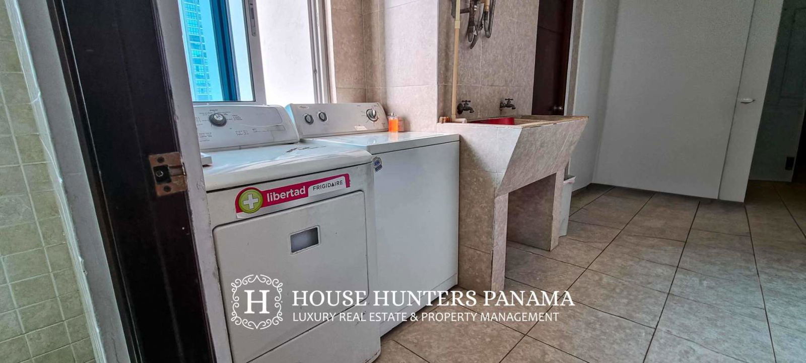 Spacious master bedroom with floor-to-ceiling windows and ocean panorama at PH Pacific Village