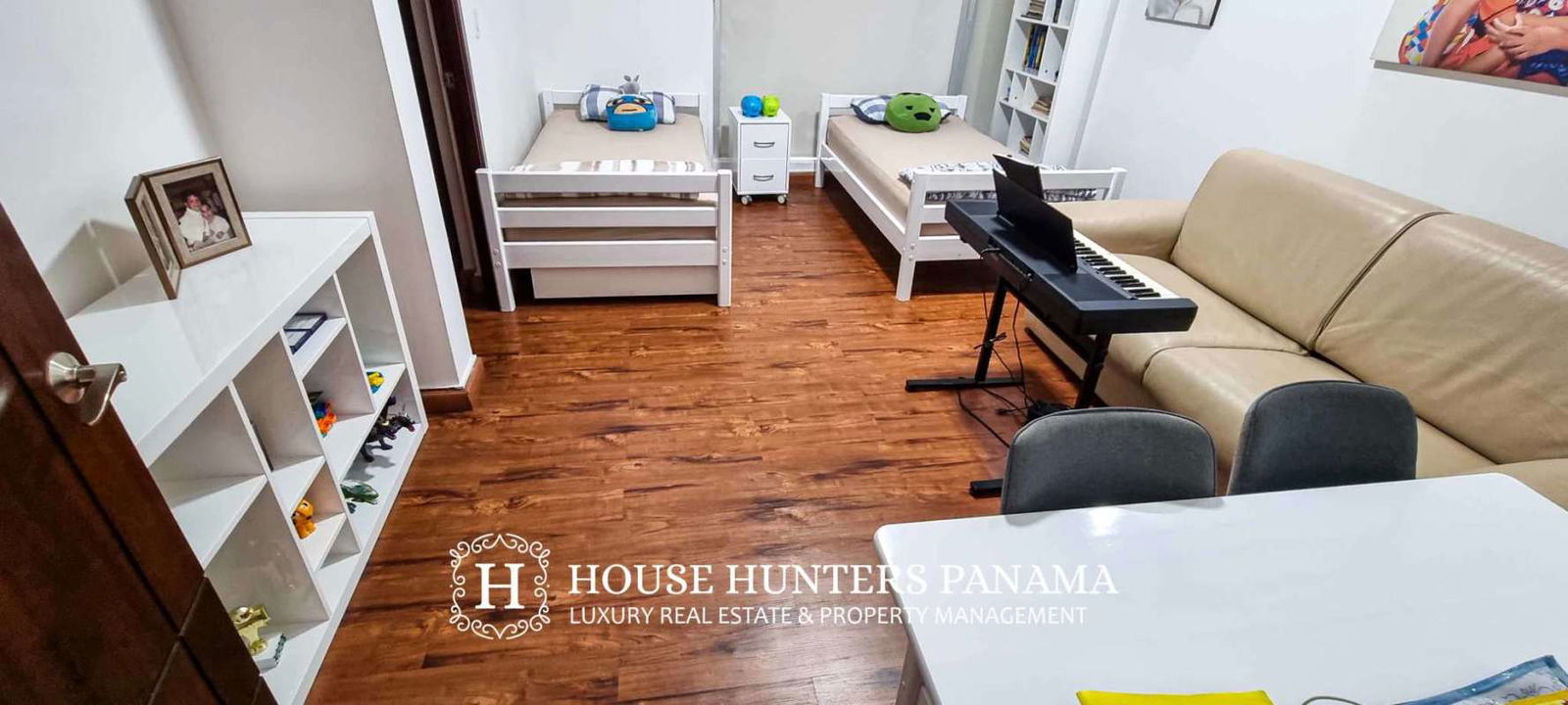 Laundry area with washer-dryer connections inside PH Pacific Village apartment Panama