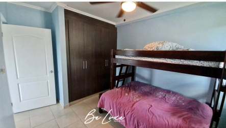 Spacious master bedroom with natural light and golf course views in PH Rodman Bijao Panama