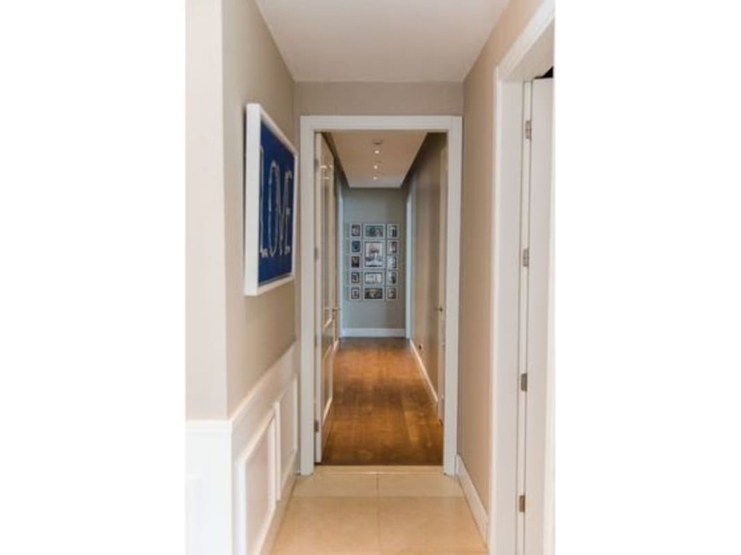 Luxury living and dining area with large windows in PH Paramount Costa del Este Panama