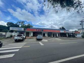 Exterior view of Plaza Don Pablo strip mall with shops parking and signage in Bugaba Chiriquí Panama