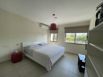 Modern kitchen granite countertops appliances Woodlands Midrise Panama Pacifico apartment