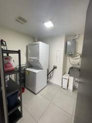 Outdoor pool sun deck green surroundings Woodlands Midrise Panama Pacifico Panama