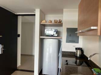 Updated bathroom with walk-in shower and granite sink studio condo for sale Playa Blanca Panama