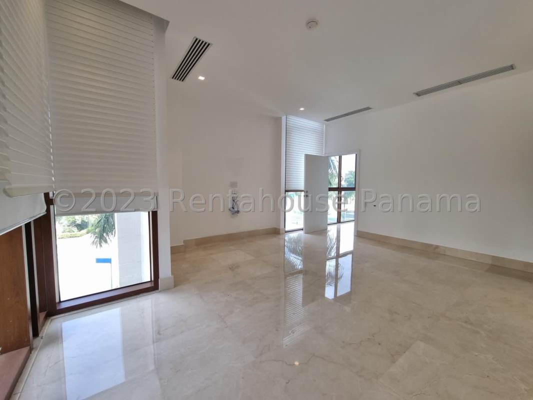 Spacious open-concept living dining room with marble floors and terrace access at PH Ocean Reef Gardens Panama