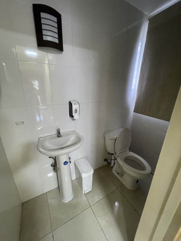 Outdoor parking lot mature trees commercial property Canal zone Panama