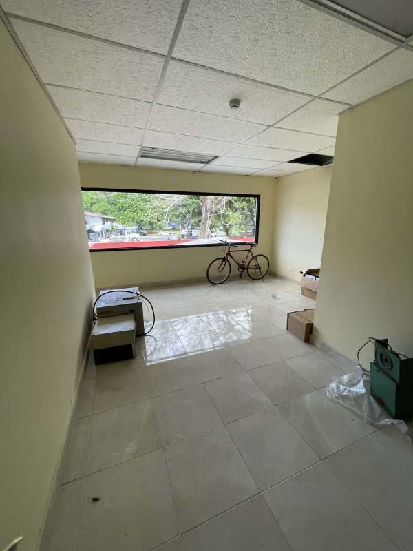 Office space tiled floor window AC empty room commercial building Panama
