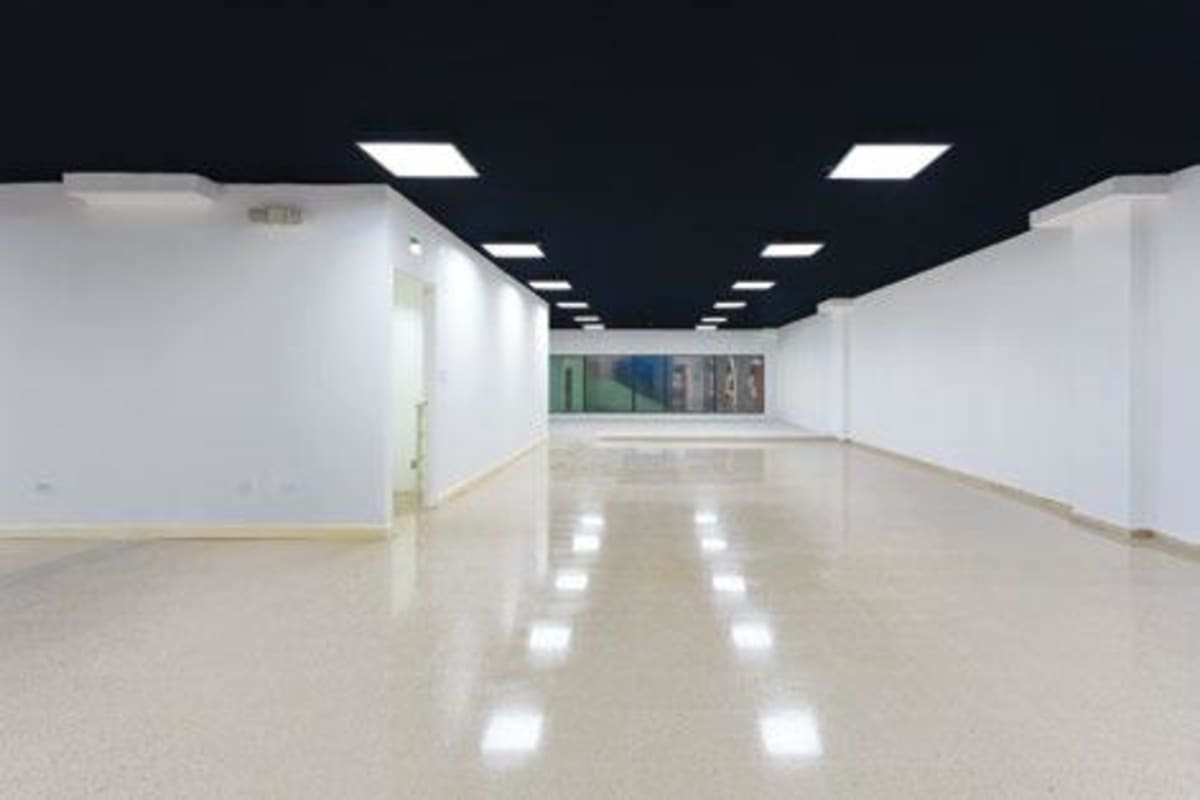 Large modern commercial interior with high ceiling, bright lighting and open space Plaza Agora Panama