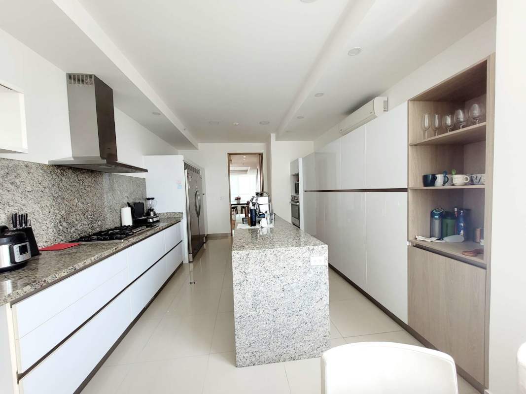 Bright open living and dining area with marble flooring in PH Aria Costa del Este Panama