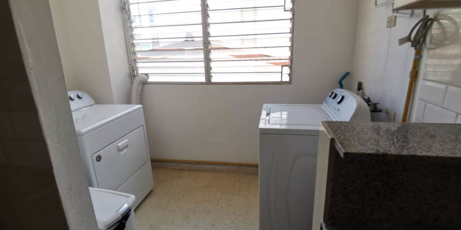 Laundry room with utility sink window washer dryer connections PH Aida Panama