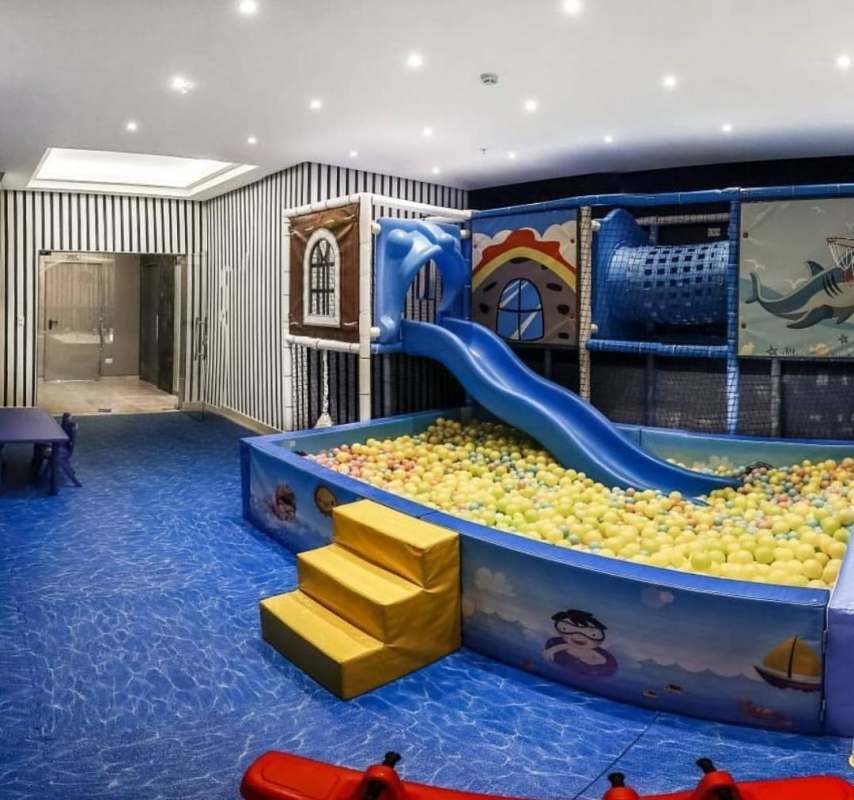 Kids play room with slide ball pit indoor Park City Obarrio