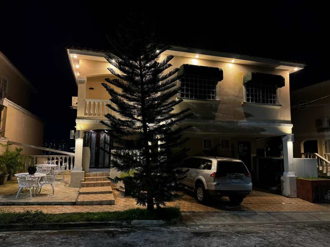 Two-story Mediterranean residence in Altos de Panamá with balcony, garage, exterior lighting