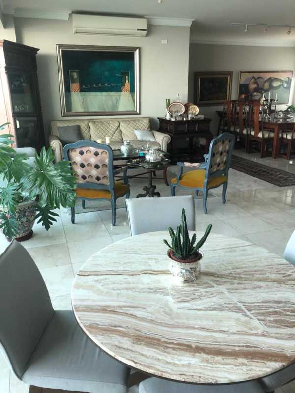 Luxury bedroom with hardwood floor, large windows and view over Panama Bay in Ocean Two condo