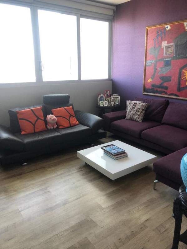 Formal dining area with marble floors and ocean backdrop in PH Ocean Two Costa del Este Panama