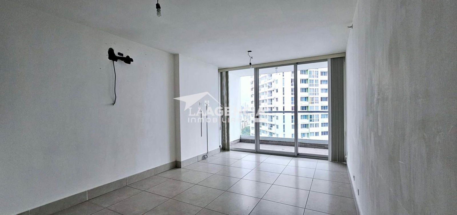 Balcony view over Panama City skyline from 24th floor apartment at PH Vivendi Green Edison Park