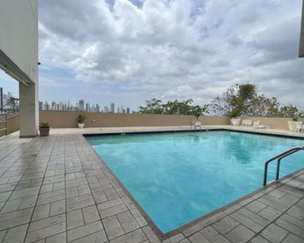Rooftop outdoor swimming pool with city skyline view in PH Majestic Garden Panama