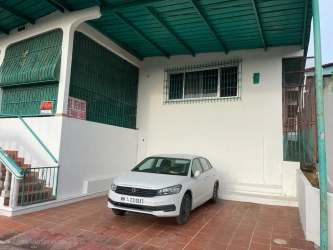 Single-family house with covered carport and driveway, fenced yard, San Agustin Panama