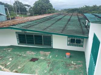 Shaded patio with view of garden and tropical plants in Arraijan