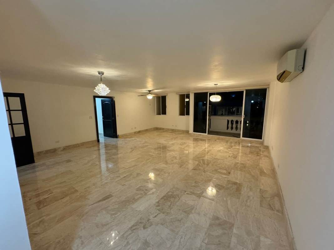 Remodeled kitchen with granite counters, marble backsplash, modern lighting in PH Obarrio Center Panama