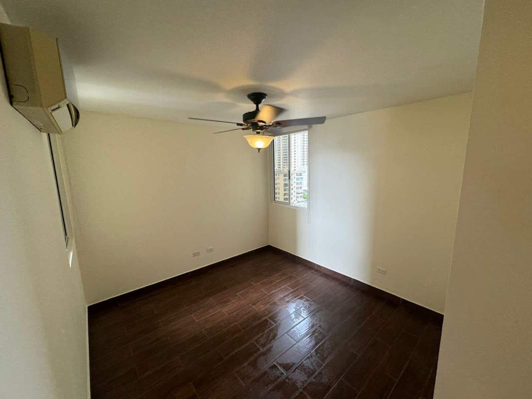 Spacious bedroom with ensuite bathroom, large window and AC at PH Obarrio Center Panama