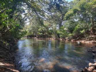 Landscaped social park area with gardens and tropical plants inside El Refugio Coclé