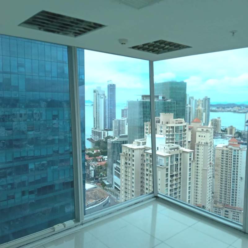 Panoramic corner office with ocean and skyline views in furnished office Oceanía Plaza Panama