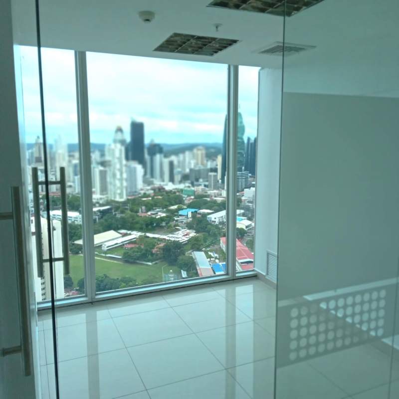 Interior view of glass-walled meeting rooms in Oceanía Business Plaza Panama City