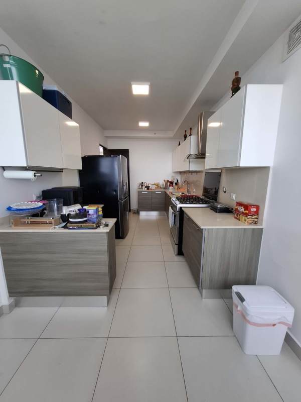 Bedroom with tile floors, large window, split AC, minimalist style Coco del Mar apartment