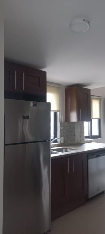 Bedroom with large window overlooking gardens Embassy Club Clayton Panama