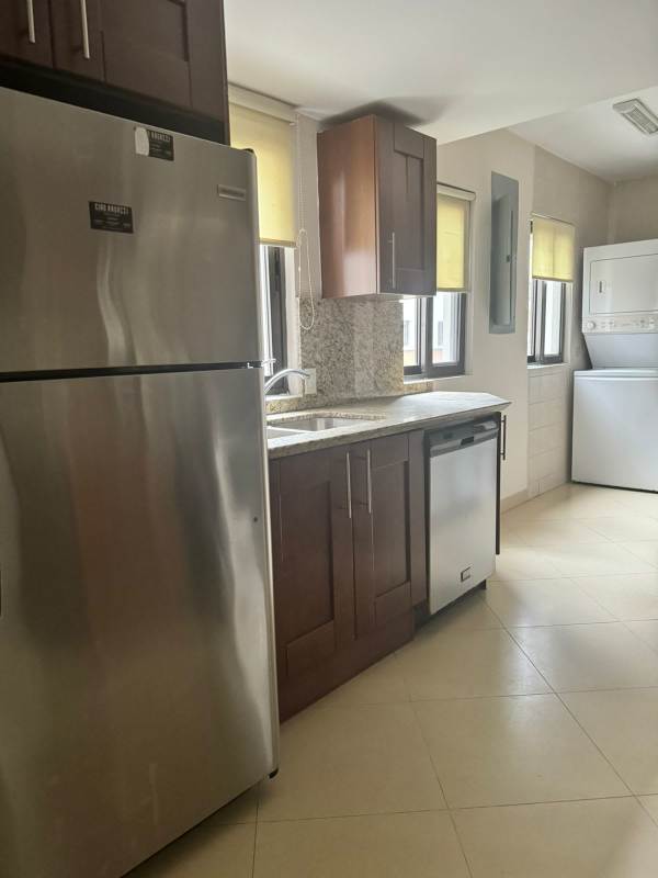 Bathroom with walk-in shower and beige tiles Embassy Club Clayton Panama